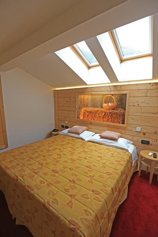 Hotel Ladina Кампітелло-ді-Фасса Номер фото